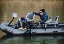 Fly Fishing New Mexico with Trisha Valdez – Small Streams to Big Tailwaters Trisha Valdez landing a trout from a Flycraft boat while fly fishing New Mexico