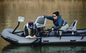 Fly Fishing New Mexico with Trisha Valdez – Small Streams to Big Tailwaters Trisha Valdez landing a trout from a Flycraft boat while fly fishing New Mexico
