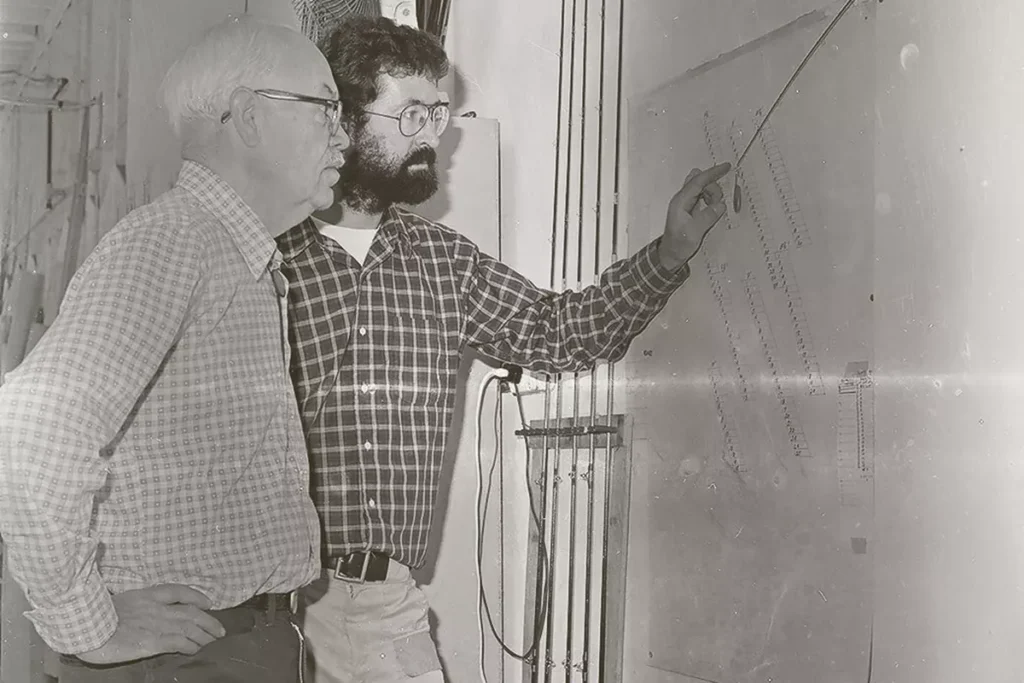 Larry Kenney and Harry Wilson designing fly rods at Scott Fly Rods in the early days of graphite fly rod innovation