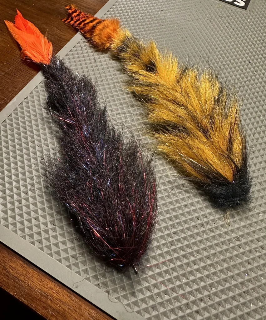 Large musky flies showing tapered profile and materials for lifelike movement in the water