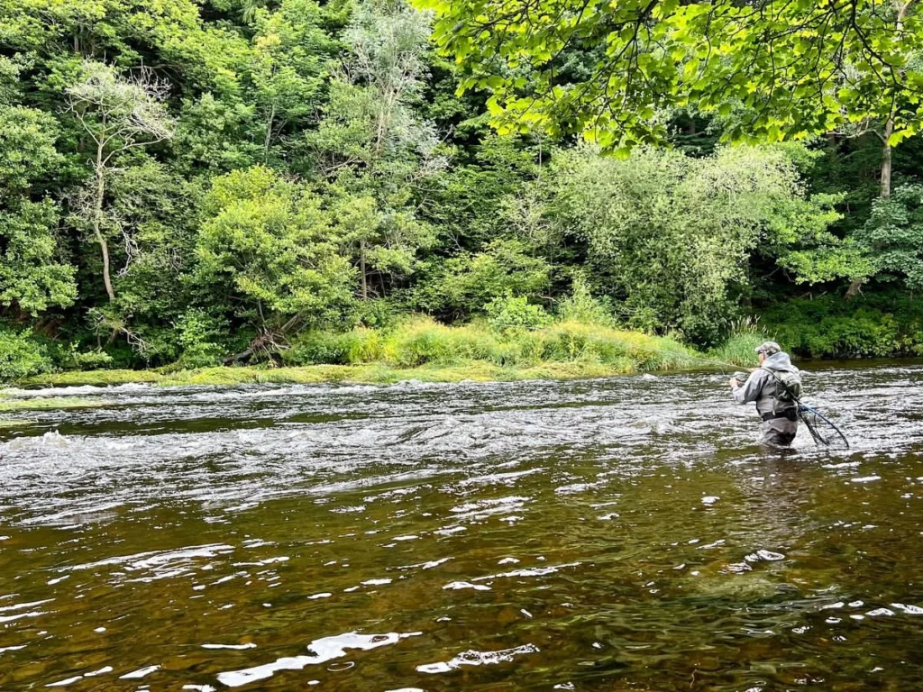 Howard-Croston-exploring-the-river-english-trout-fishing.